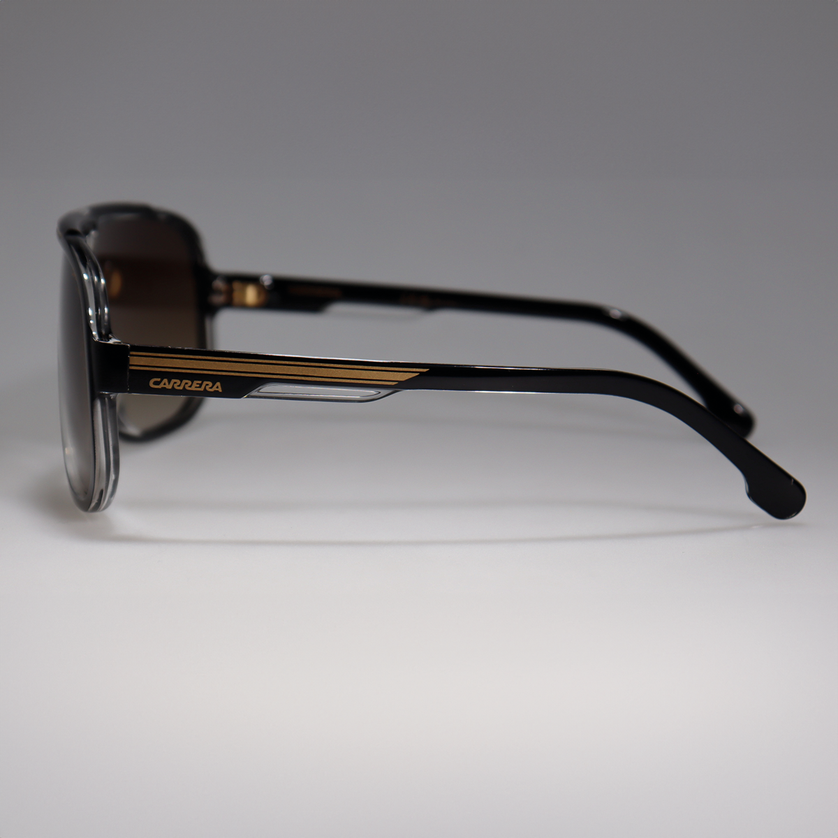Óculos de Sol Carrera 1057S Black Gold on Clear Gradient Brown